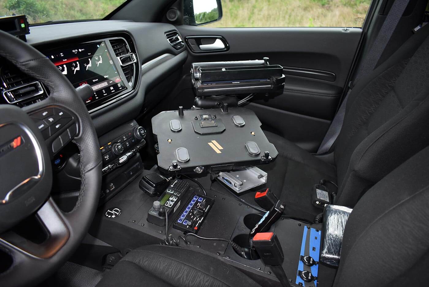 Center console computer mount and radio